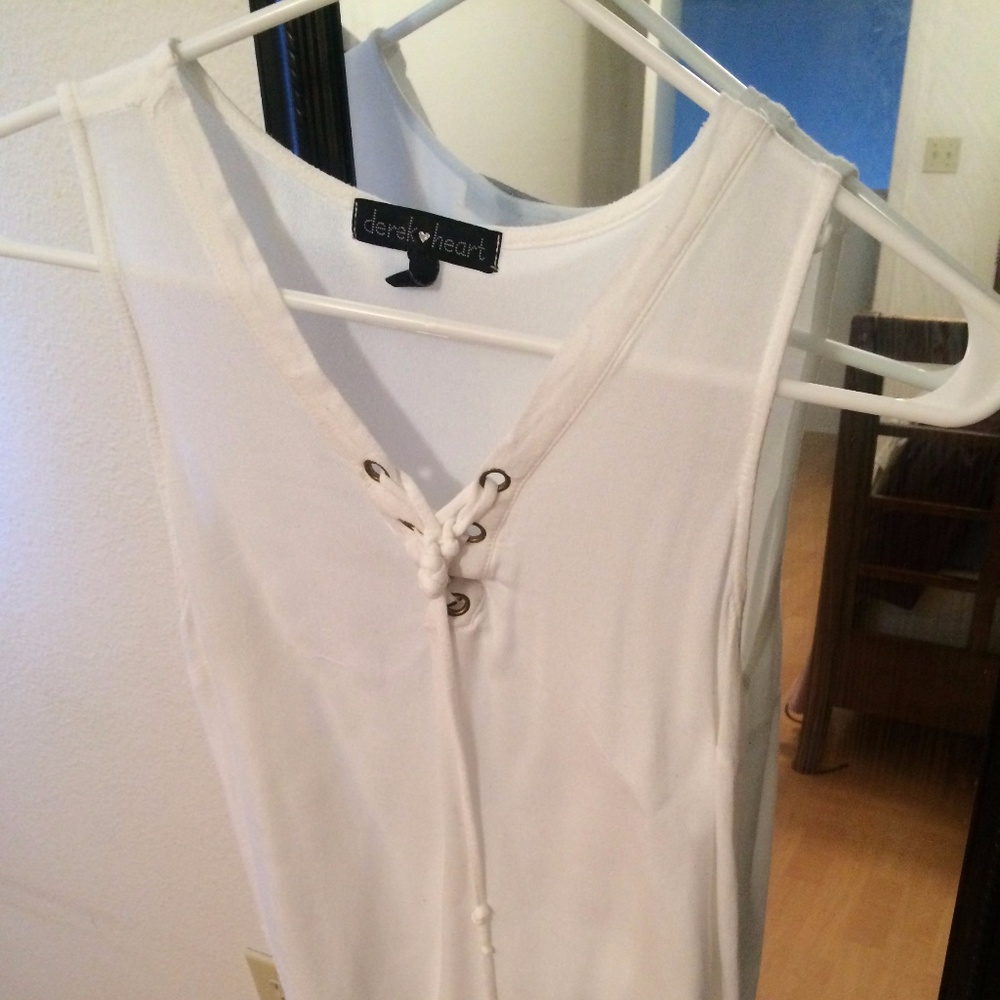 white sleeveless  blouse